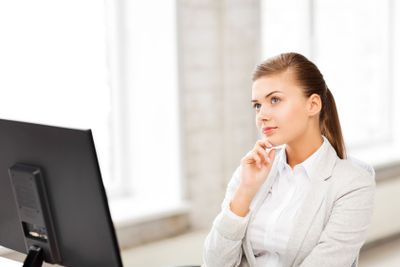 pensive woman in office