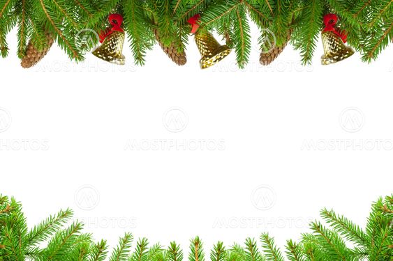 Spruce branches with cones and bells on a white background