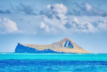 Ocean, island and water at beach for vacation, holiday...