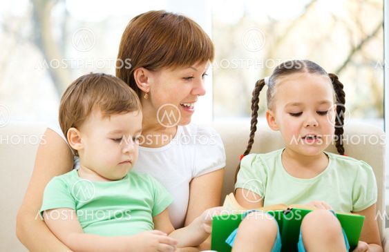 Family is reading book