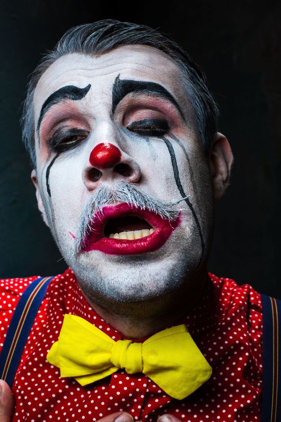 Terrible crazy clown and Halloween theme
