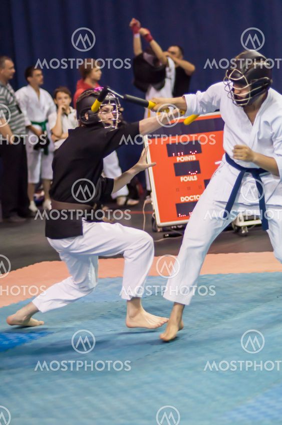 Kobudo competition men with nunchaku