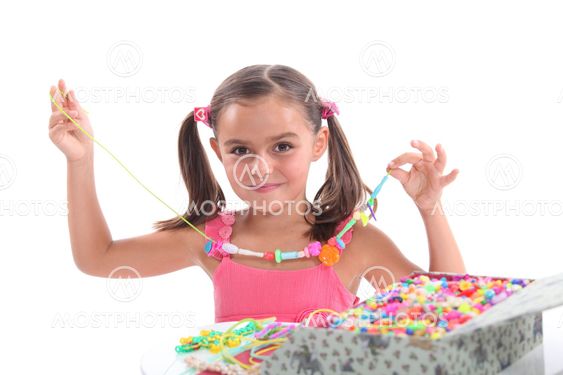 Little girl with necklace