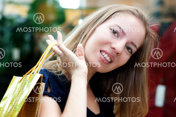 beautiful woman with shopping bags