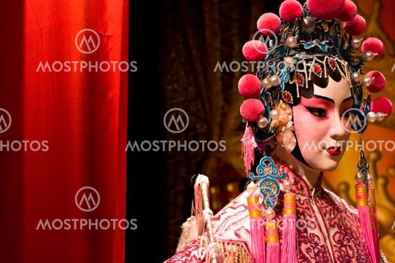 chinese opera dummy and red cloth as text space ,it is a toy,not real man