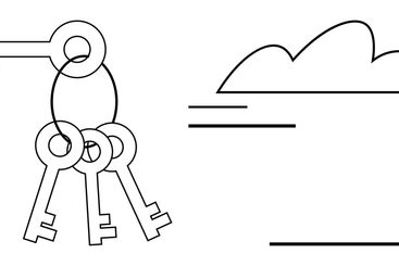 Set of vintage keys hanging beside a cloud outline with...