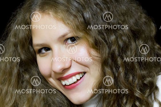 Young woman with long brown nature hair