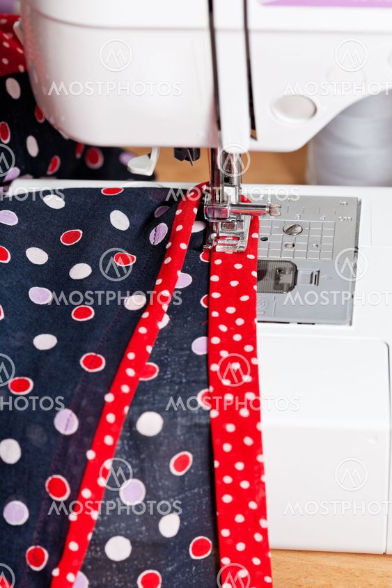sewing dress on machine