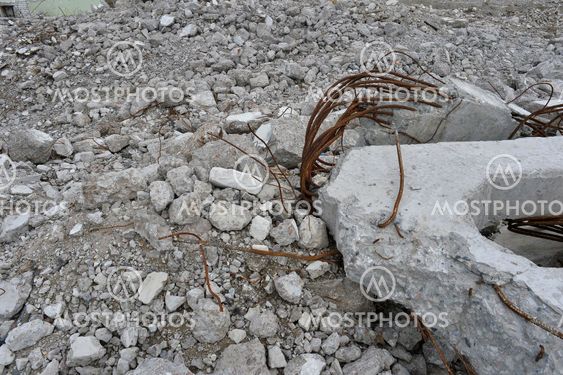Pieces of Metal and Stone are Crumbling from Demolished Building Floors