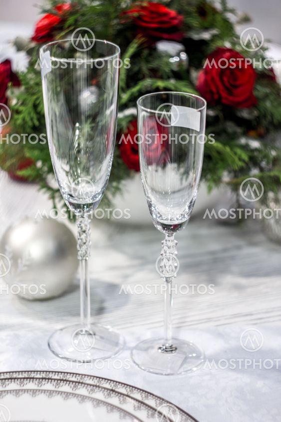 Two wineglasses and bunch of roses