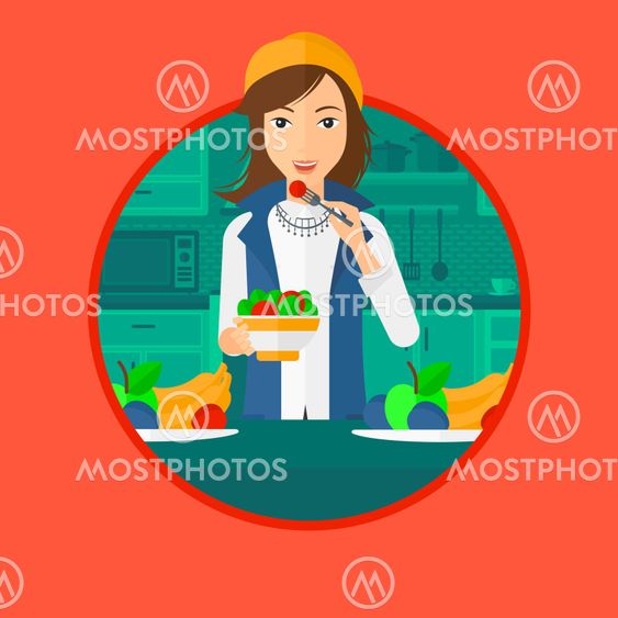 Woman eating healthy vegetable salad.