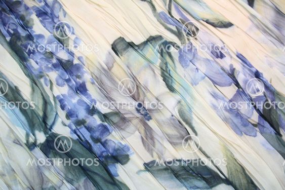 Water colour pattern from blue flowers on a fabric for background
