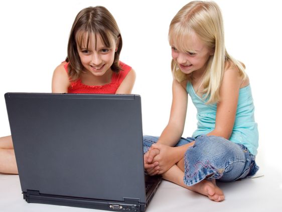 Sisters using a laptop
