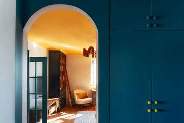 Cozy stylish interior of the living room. An arched...