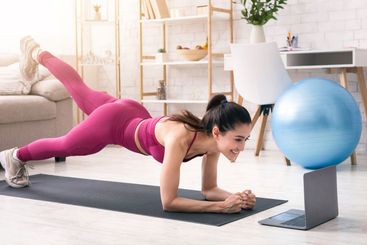 Sports during quarantine. Beautiful girl participating...