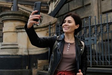 Beautiful Woman Strolls In European City