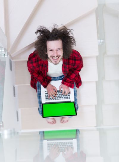 freelancer in bathrobe working from home