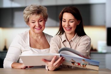 Child Family Photoalbum Or Photobook. Mother Looking