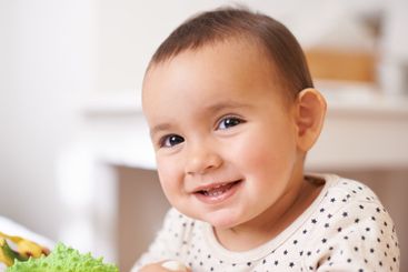 Baby, toddler portrait and toy in home, childhood and...