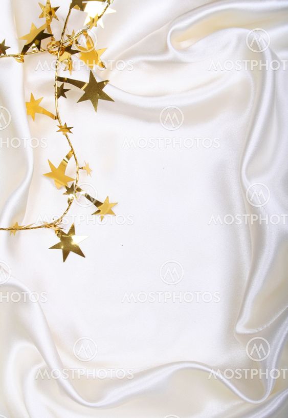 Golden stars and spangles on white silk