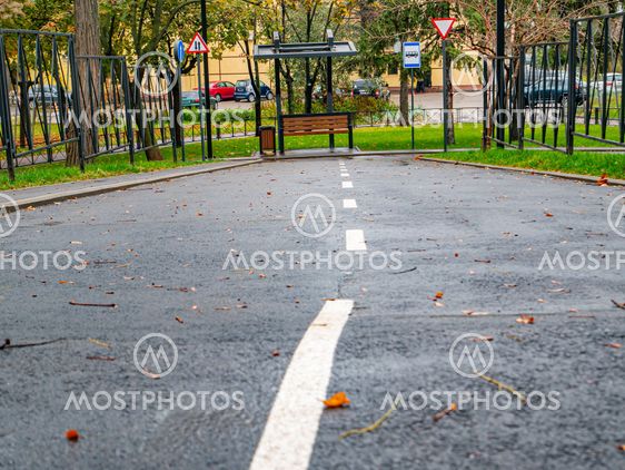 Empty road with a public transport stop.