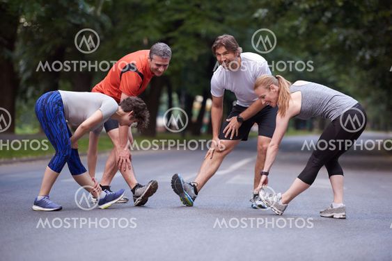jogging people group stretching