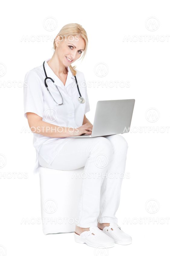 Medical doctor working on laptop