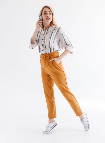 Full length photo of beautiful blond woman wearing...