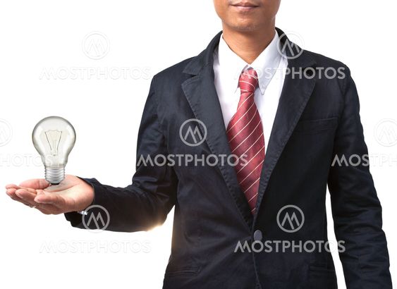 man and light bulb on hand isolated white