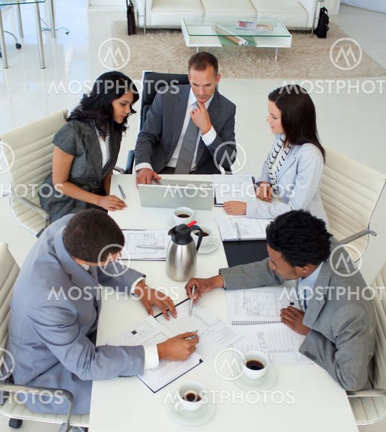 High angle of businessteam working in a meeting