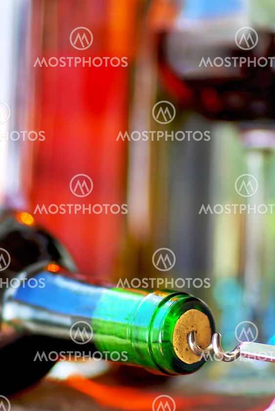Wine Bottle closeup and corkscrew.