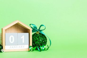 1 january. Christmas composition on colored background...