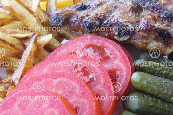 Grilled pork ribs with vegetables
