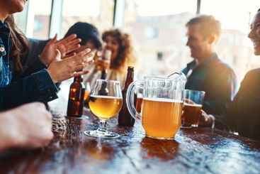 Bar, group and hands for beer, fun and party for joy,...