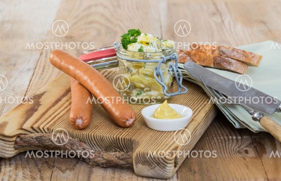 Sausages with mustard and potato salad