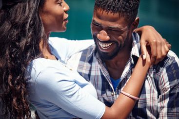 Love, black couple and laughing together outdoor with...