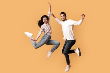 Unbelievable Sales. Overjoyed Arab Couple Jumping In The...