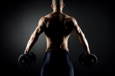 Muscular man weightlifting