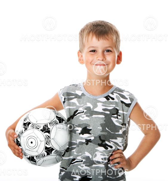 Boy holding soccer ball