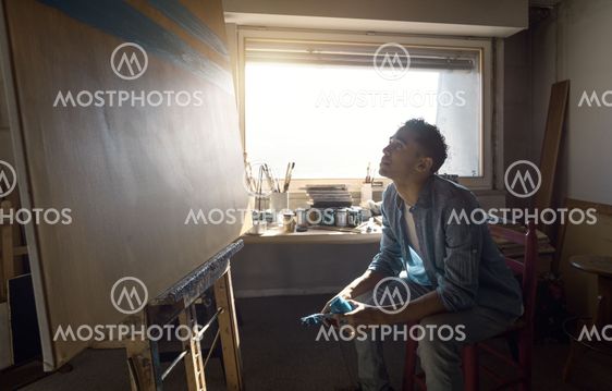 Creative artist sitting in the studio and working