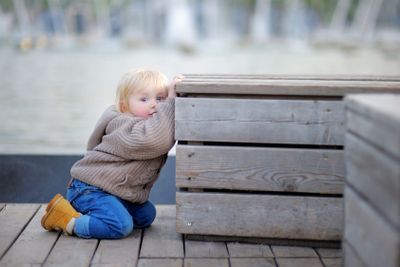 Toddler boy playing outdoors