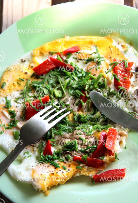 Omelet with mushrooms, onion and paprika