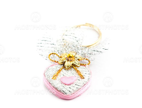 Pink heart trinket (love, valentine day series on the white background