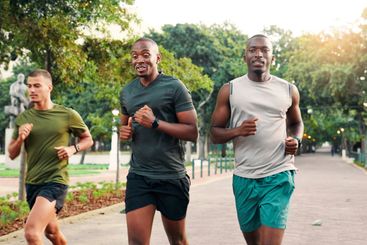 Running, friends and men in park for workout, marathon...