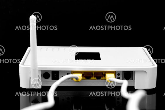 Wireless router with cables flying out, on a black background