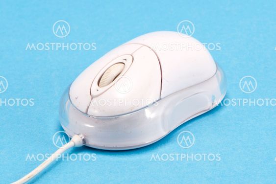 computer mouse control device on blue background