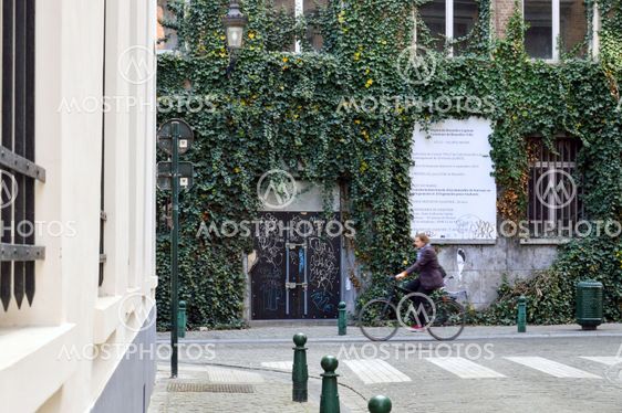 Brussels, Belgium - April 2015: Preserved old European-style residential and commercial buildings on streets of Brussels City, Belgium