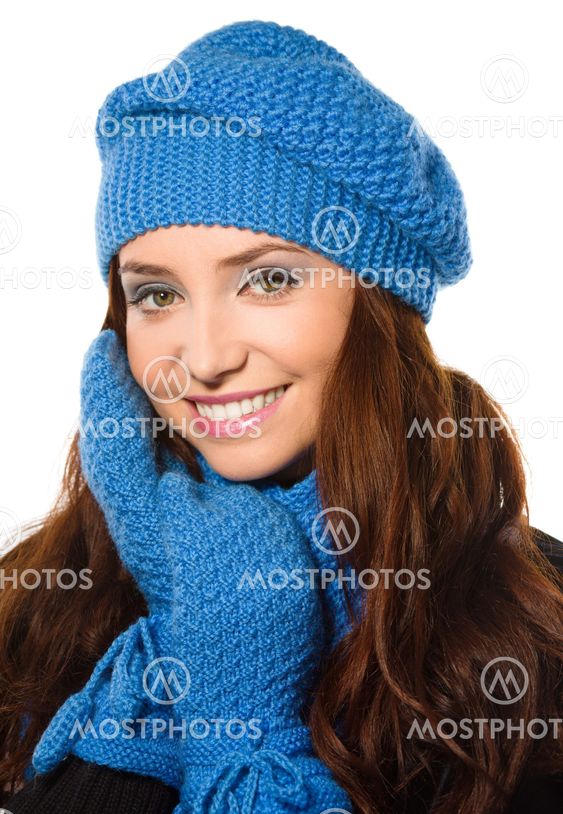 Young happy woman wearing winter cloth