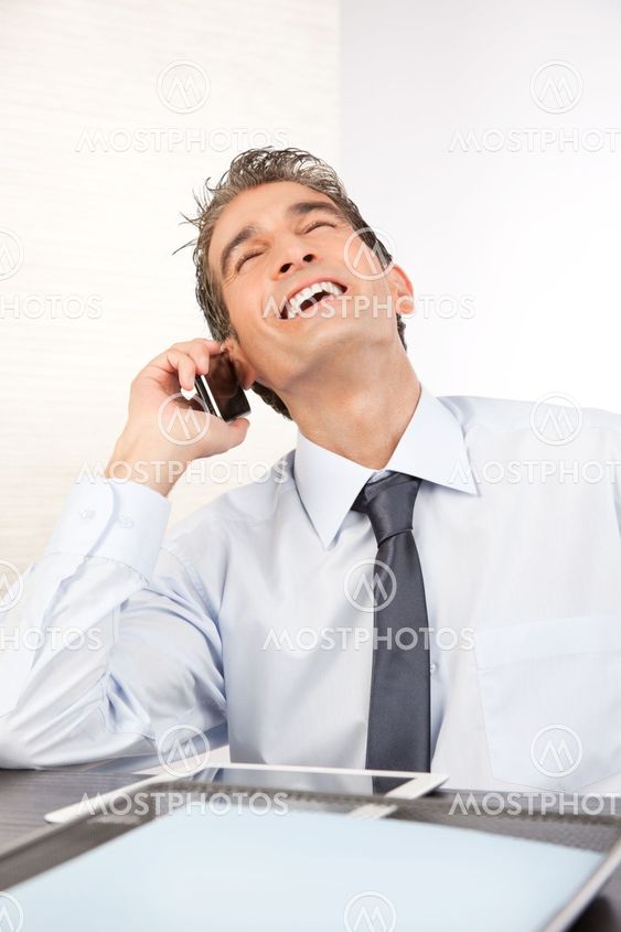 Businessman Talking on Cell Phone