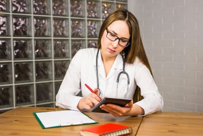 healthcare, technology and medicine concept - smiling...